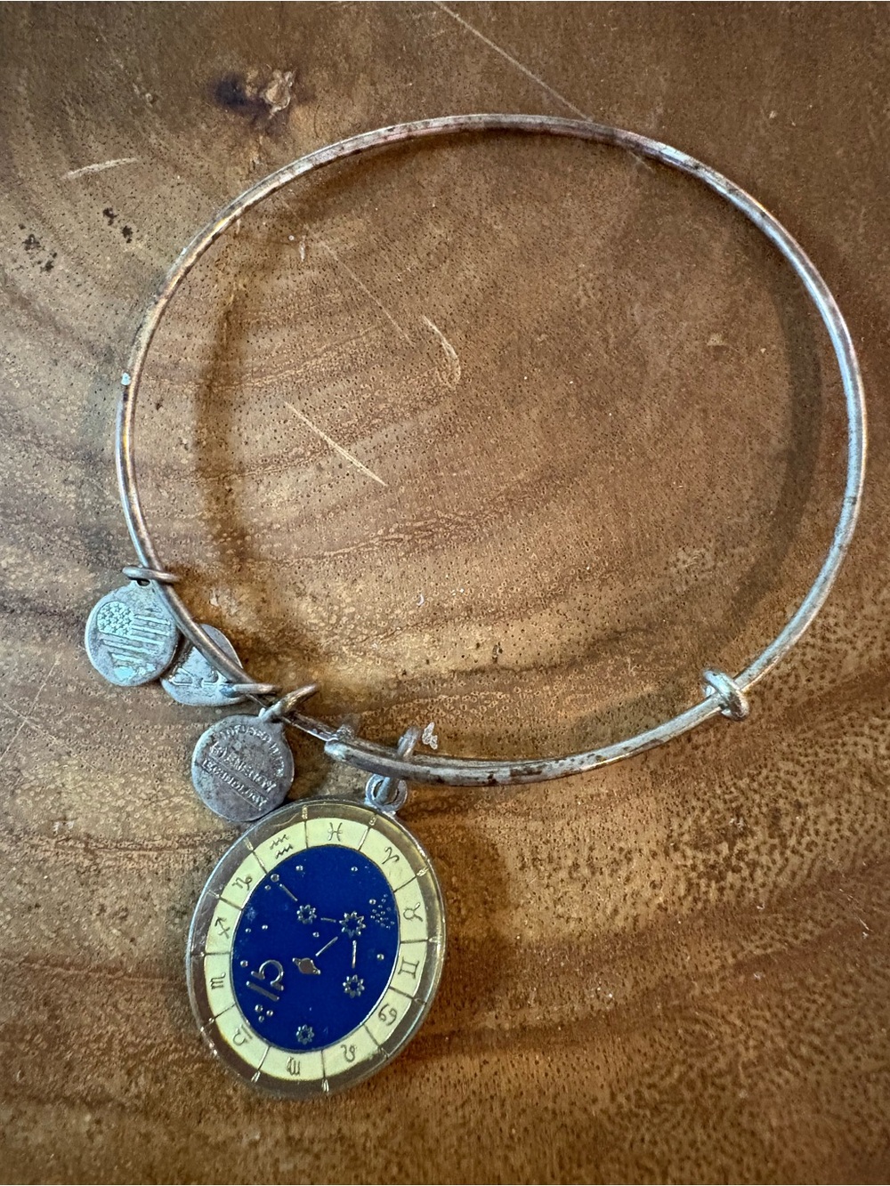 Alex and Ani silver bracelet with libra charm